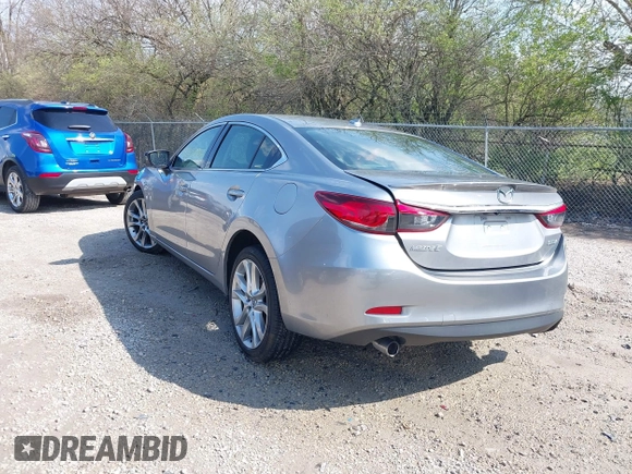 2015 Mazda 6 i Grand Touring with VIN JM1GJ1W52F1195333, listed as a IAAI auction lot 42014865 with 107,039 mi miles and . Bid and sale history available at DreamBid. Image 3.