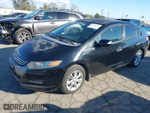 2010 Honda Insight EX with VIN JHMZE2H74AS012517, listed as a IAAI auction lot 41886588 with 227,428 mi miles and . Bid and sale history available at DreamBid. Image 2.