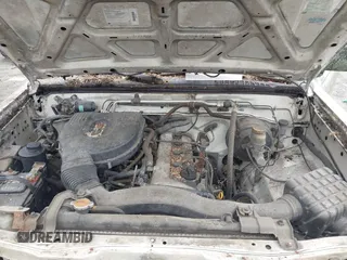 1998 Nissan Frontier XE z VIN 1N6DD26SXWC349603, wystawiony jako IAAI lot #42220949 z przebiegiem Nie podano mil oraz . Historia ofert i sprzedaży dostępna na DreamBid. Obrazek 10.