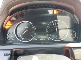 2014 BMW 7 Series 740Li with VIN WBAYE4C59ED137938, listed as a Copart auction lot 55281005 with 146,659 mi miles and Salvage Title. Bid and sale history available at carsss.com. Image 9.