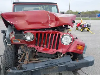 1998 Jeep Wrangler SE with VIN 1J4FY29PXWP785510, listed as a IAAI auction lot 41998116 with 92,390 mi miles and . Bid and sale history available at DreamBid. Image 6.