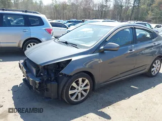2012 Hyundai Accent GLS with VIN KMHCU4AE9CU167338, listed as a IAAI auction lot 42079550 with 121,889 mi miles. Bid and sale history available at carsss.com. Image 2.