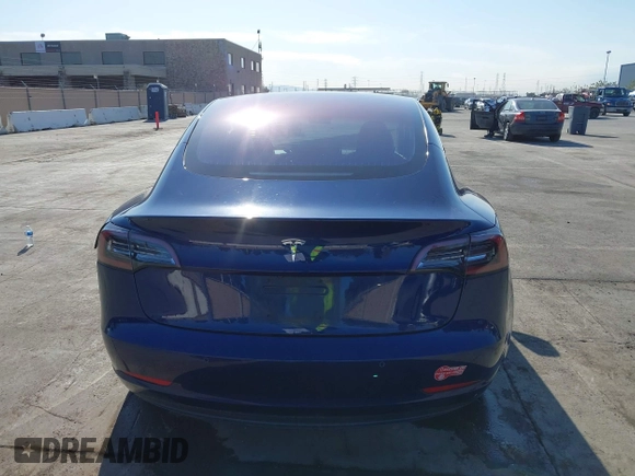 2018 Tesla Model 3 Long Range Battery with VIN 5YJ3E1EA4JF011799, listed as a IAAI auction lot 41765860 with 133,098 mi miles. Bid and sale history available at carsss.com. Image 16.