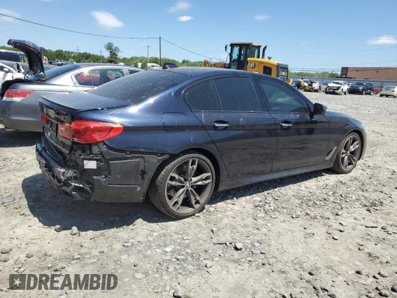 2018 BMW 5 Series M550i xDrive with VIN WBAJB9C56JB286479, listed as a Copart auction lot 57108645 with 71,782 mi miles and Salvage title. Bid and sale history available at DreamBid. Image 3.