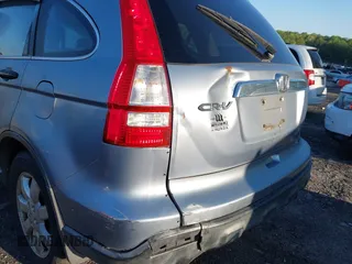 2008 Honda CR-V EX with VIN JHLRE48538C002693, listed as a IAAI auction lot 41989815 with 194,351 mi miles. Bid and sale history available at carsss.com. Image 12.