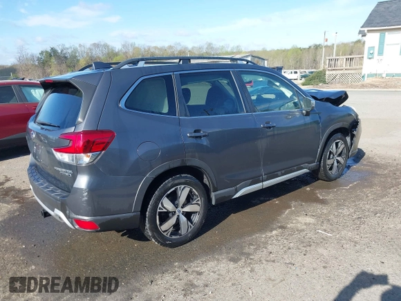 2020 Subaru Forester Touring with VIN JF2SKAXC0LH601036, listed as a IAAI auction lot 41911952 with 102,257 mi miles. Bid and sale history available at carsss.com. Image 4.