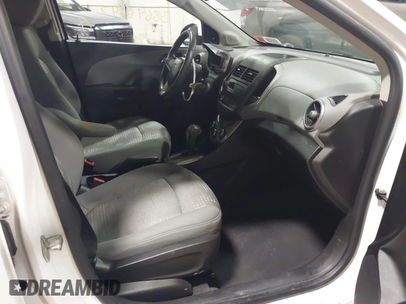 2014 Chevrolet Sonic LS with VIN 1G1JA6SG4E4208132, listed as a IAAI auction lot 38646142 with 154,013 mi miles and . Bid and sale history available at DreamBid. Image 5.