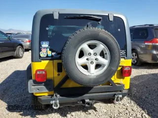 2002 Jeep Wrangler X with VIN 1J4FA39S42P725876, listed as a Copart auction lot 71789864 with 154,991 mi miles and Salvage Title. Bid and sale history available at carsss.com. Image 6.