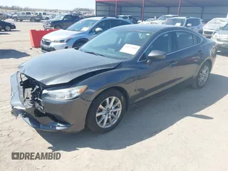 2016 Mazda 6 i Sport with VIN JM1GJ1U56G1473526, listed as a IAAI auction lot 41977842 with 85,542 mi miles and . Bid and sale history available at DreamBid. Image 2.