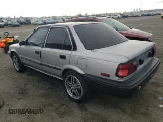1992 Toyota Corolla z VIN 1NXAE91A1NZ346555, wystawiony jako Copart lot #37697334 z przebiegiem 232 988 mil mil oraz Szkoda całkowita • Salvage title. Historia ofert i sprzedaży dostępna na DreamBid. Obrazek 2.