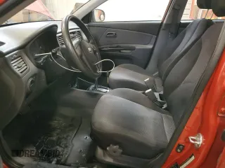 2010 Kia Rio with VIN KNADH4B39A6691792, listed as a Copart auction lot 80043064 with 161,139 mi miles and Salvage Title. Bid and sale history available at DreamBid. Image 7.