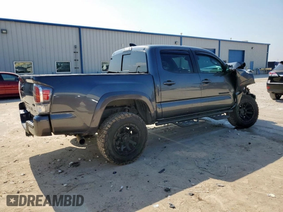 2021 Toyota Tacoma SR with VIN 3TMCZ5AN9MM451389, listed as a Copart auction lot 59191355 with 26,427 mi miles and Salvage title. Bid and sale history available at DreamBid. Image 3.