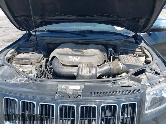 2014 Jeep Grand Cherokee Laredo with VIN 1C4RJEAG9EC157383, listed as a IAAI auction lot 42074411 with 213,566 mi miles and . Bid and sale history available at DreamBid. Image 10.