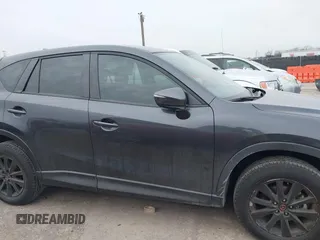 2016 Mazda CX-5 Sport with VIN JM3KE2BY4G0858100, listed as a IAAI auction lot 41368135 with 93,435 mi miles. Bid and sale history available at carsss.com. Image 13.