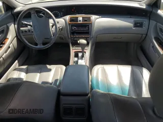 2001 Toyota Avalon XL z VIN 4T1BF28B11U154831, wystawiony jako Copart lot #57131435 z przebiegiem 211 745 mil mil oraz Szkody całkowita. Historia ofert i sprzedaży dostępna na DreamBid. Obrazek 8.
