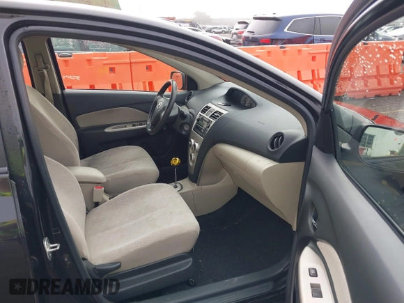 2008 Toyota Yaris with VIN JTDBT903284012329, listed as a IAAI auction lot 41879489 with 117,041 mi miles. Bid and sale history available at carsss.com. Image 5.