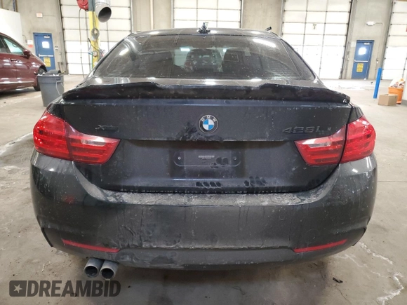 2015 BMW 4 Series 428i xDrive z VIN WBA3N9C56FK246152, wystawiony jako Copart lot #88752565 z przebiegiem 56 233 mil mil oraz Szkoda całkowita • Salvage title. Historia ofert i sprzedaży dostępna na DreamBid. Obrazek 6.