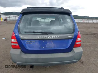 2003 Subaru Forester XS with VIN JF1SG65643H715427, listed as a IAAI auction lot 41935620 with 248,726 mi miles. Bid and sale history available at carsss.com. Image 16.
