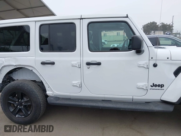 2023 Jeep Wrangler Sahara with VIN 1C4HJXEG5PW581632, listed as a IAAI auction lot 42462622 with 24,550 mi miles and . Bid and sale history available at DreamBid. Image 13.