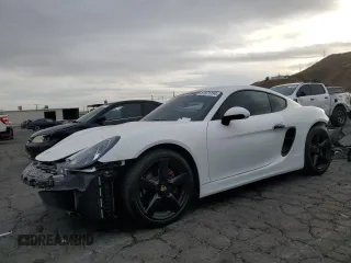 2015 Porsche 718 Cayman z VIN WP0AA2A8XFK164824, wystawiony jako Copart lot #81571154 z przebiegiem 26 535 mil mil oraz Szkoda całkowita • Salvage title. Historia ofert i sprzedaży dostępna na DreamBid. Obrazek 1.