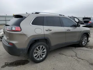 2021 Jeep Cherokee Altitude with VIN 1C4PJLLB3MD169129, listed as a Copart auction lot 82715734 with 59,468 mi miles and Salvage Title. Bid and sale history available at carsss.com. Image 3.