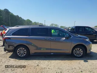 2021 Toyota Sienna XLE z VIN 5TDYRKEC0MS007394, wystawiony jako IAAI lot #42080004 z przebiegiem 75 553 mil mil oraz . Historia ofert i sprzedaży dostępna na DreamBid. Obrazek 14.