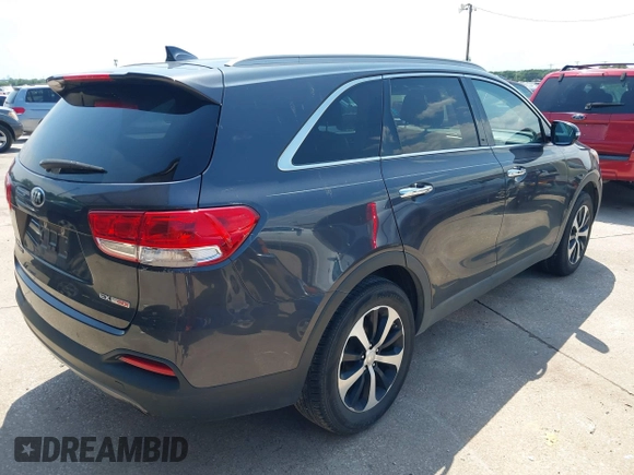 2017 Kia Sorento EX with VIN 5XYPH4A14HG190770, listed as a IAAI auction lot 42501305 with 156,570 mi miles and . Bid and sale history available at DreamBid. Image 4.