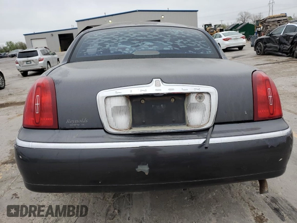 2001 Lincoln Town Car Signature with VIN 1LNHM82W11Y683915, listed as a Copart auction lot 50395865 with Not provided miles and Non repairable. Bid and sale history available at DreamBid. Image 6.