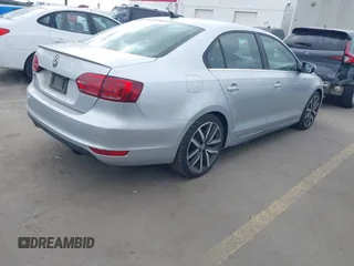 2014 Volkswagen Jetta GLI Edition 30 с VIN 3VW4S7AJ2EM214517, выставлен на аукционе IAAI как лот 41662860 с пробегом 185 783 миль миль и . История ставок и продаж доступна на DreamBid. Изображение 4.