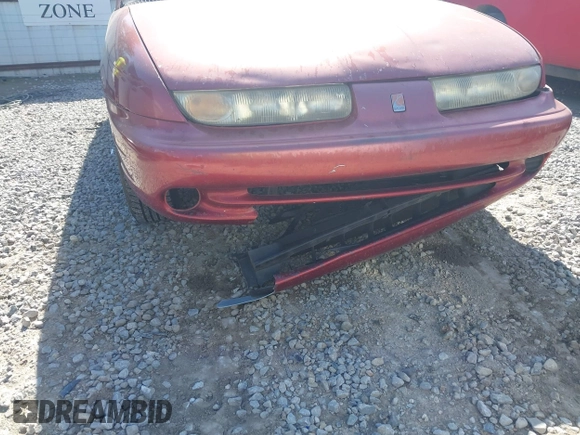 1998 Saturn SL z VIN 1G8ZK5270WZ223002, wystawiony jako IAAI lot #41959507 z przebiegiem Nie podano mil oraz . Historia ofert i sprzedaży dostępna na DreamBid. Obrazek 6.