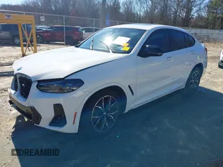 2024 BMW X4 M40i with VIN 5UX43DT00R9W43645, listed as a IAAI auction lot 41578936 with 11,028 mi miles. Bid and sale history available at carsss.com. Image 17.
