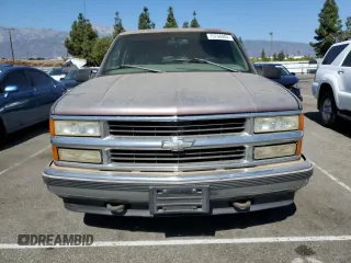 1997 Chevrolet Suburban with VIN 1GNEC16R4VJ418725, listed as a Copart auction lot 75766084 with 216,722 mi miles and Salvage Title. Bid and sale history available at carsss.com. Image 5.