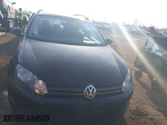 2012 Volkswagen Jetta SportWagen TDI with VIN 3VWPL7AJ8CM702152, listed as a IAAI auction lot 41770833 with 129,621 mi miles. Bid and sale history available at carsss.com. Image 12.