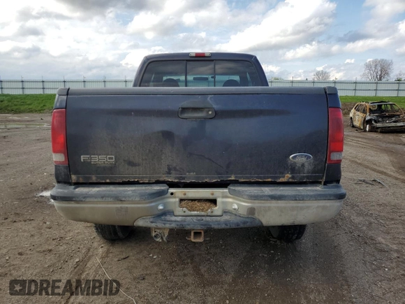 2000 Ford F-350 XL with VIN 1FTSX31S2YEE37213, listed as a Copart auction lot 54300595 with 141,273 mi miles and Clean title. Bid and sale history available at DreamBid. Image 6.