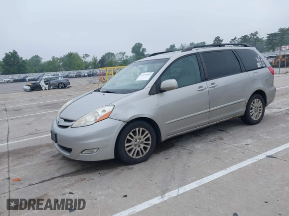 2009 Toyota Sienna XLE with VIN 5TDZK22C49S258892, listed as a IAAI auction lot 42453604 with 288,183 mi miles and . Bid and sale history available at DreamBid. Image 2.