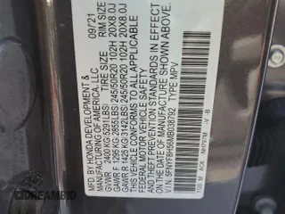 2021 Honda Passport EX-L z VIN 5FNYF8H56MB038792, wystawiony jako Copart lot #52552585 z przebiegiem 16 000 mil mil oraz Nie do naprawy. Historia ofert i sprzedaży dostępna na DreamBid. Obrazek 15.