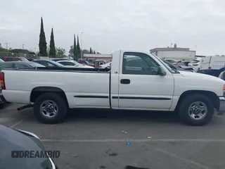 2000 GMC New Sierra 1500 SLE with VIN 1GTEC14T4YE363679, listed as a IAAI auction lot 41467204 with 150,724 mi miles. Bid and sale history available at carsss.com. Image 12.