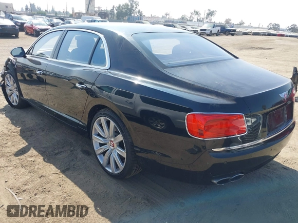 2015 Bentley Flying Spur V8 with VIN SCBET9ZA3FC042007, listed as a IAAI auction lot 40551620 with 27,039 mi miles and . Bid and sale history available at DreamBid. Image 3.