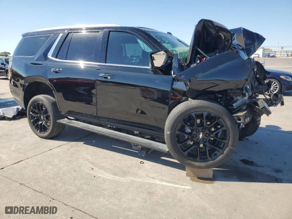 2022 Chevrolet Tahoe High Country with VIN 1GNSKTKL7NR359349, listed as a Copart auction lot 77077774 with 22,438 mi miles and Salvage Title. Bid and sale history available at carsss.com. Image 4.