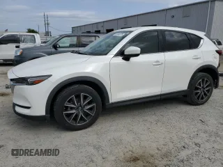 2017 Mazda CX-5 Grand Touring with VIN JM3KFADL9H0220886, listed as a Copart auction lot 50344675 with 75,781 mi miles and Salvage Title. Bid and sale history available at carsss.com. Image 1.
