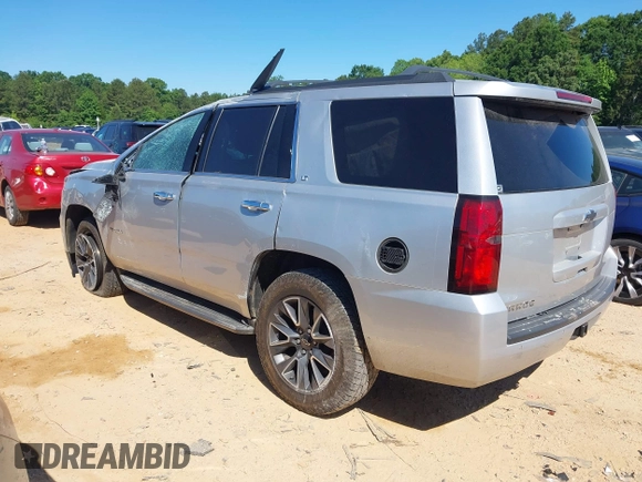 2020 Chevrolet Tahoe LT with VIN 1GNSKBKC5LR121085, listed as a IAAI auction lot 42341677 with 123,579 mi miles and . Bid and sale history available at DreamBid. Image 3.