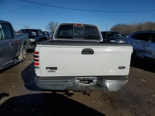 2002 Ford F-150 XL with VIN 1FTRX17L52NA26169, listed as a Copart auction lot 88756715 with 114,841 mi miles and Salvage title. Bid and sale history available at DreamBid. Image 6.
