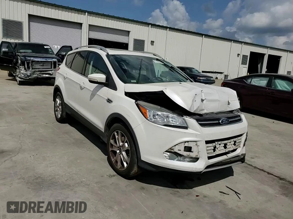 2016 Ford Escape Titanium with VIN 1FMCU9J94GUB31594, listed as a Copart auction lot 51690565 with 119,699 mi miles and Salvage Title. Bid and sale history available at DreamBid. Image 10.
