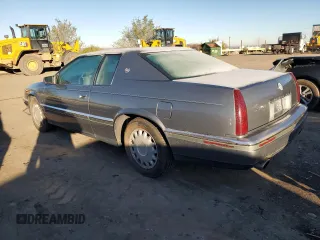 1993 Cadillac Eldorado z VIN 1G6EL12B1PU616913, wystawiony jako Copart lot #80311794 z przebiegiem 174 556 mil mil oraz Szkoda całkowita • Salvage title. Historia ofert i sprzedaży dostępna na DreamBid. Obrazek 2.