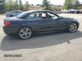 2014 BMW 4 Series 435i with VIN WBA3T3C59EP736749, listed as a Copart auction lot 76011404 with 48,815 mi miles and Salvage title. Bid and sale history available at DreamBid. Image 3.
