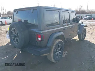 2018 Jeep Wrangler Unlimited Sport S with VIN 1C4HJXDN0JW255003, listed as a IAAI auction lot 41528394 with 55,660 mi miles and . Bid and sale history available at DreamBid. Image 4.