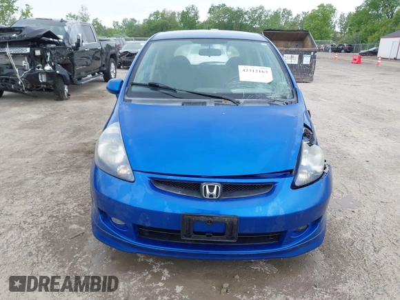 2007 Honda Fit Sport z VIN JHMGD38697S066329, wystawiony jako IAAI lot #42312163 z przebiegiem 174 935 mil mil oraz . Historia ofert i sprzedaży dostępna na DreamBid. Obrazek 12.