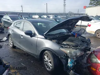 2015 Mazda 3 i Grand Touring z VIN JM1BM1M73F1235036, wystawiony jako IAAI lot #41356312 z przebiegiem 174 235 mil mil oraz . Historia ofert i sprzedaży dostępna na DreamBid. Obrazek 1.