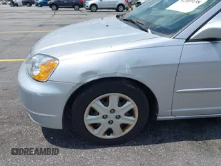 2003 Honda Civic EX with VIN 1HGES26753L007546, listed as a IAAI auction lot 42169138 with 151,688 mi miles. Bid and sale history available at carsss.com. Image 6.