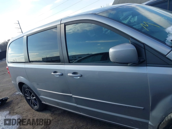2016 Dodge Grand Caravan SE with VIN 2C4RDGBG7GR252195, listed as a IAAI auction lot 41415977 with 199,453 mi miles and . Bid and sale history available at DreamBid. Image 14.